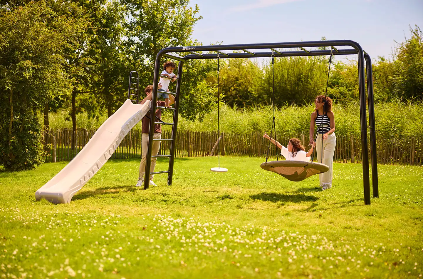 BERG PlayBase monkey bars and climbing frame in a garden