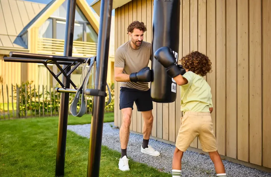 BERG PlayBase frame with a boxing bag